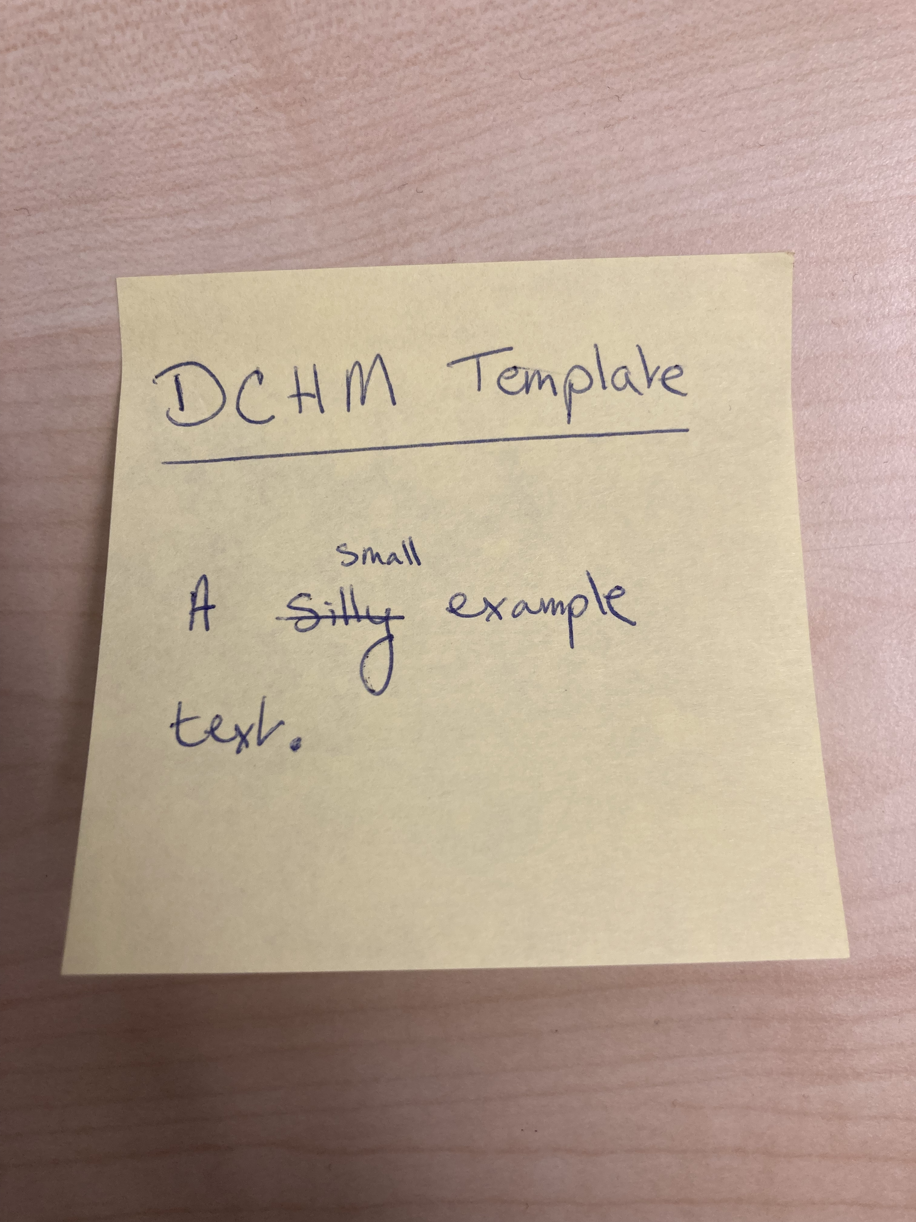
               A photograph of the front of a post-it with a simple example phrase.
            